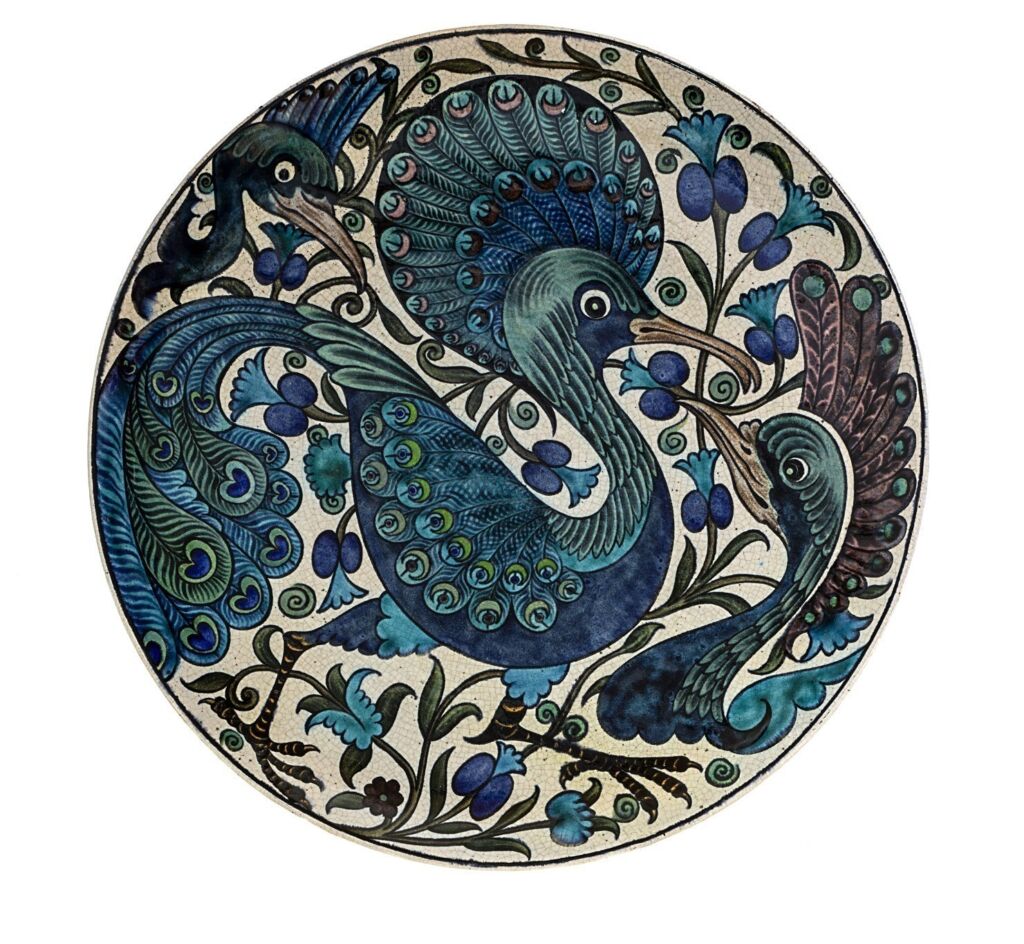 Fantastical Peacock Plate, 1888 - 1907, William de Morgan © De Morgan Collection being displayed at Newcastle's Laing Art Gallery